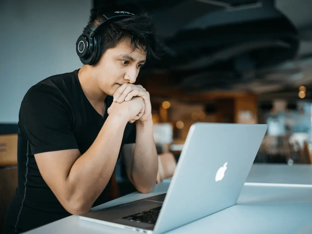 A man doing email outreach.
