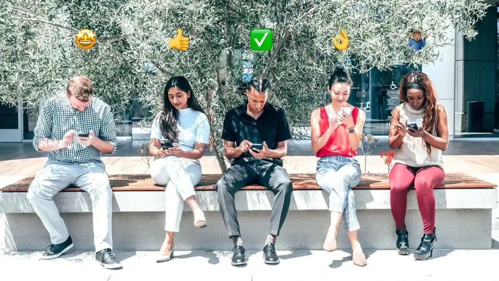 five people using their mobile phone