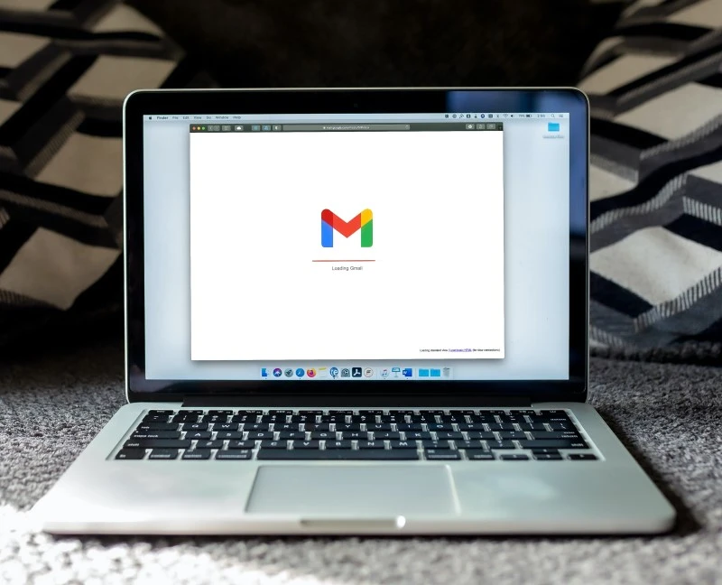 A laptop opening the Gmail